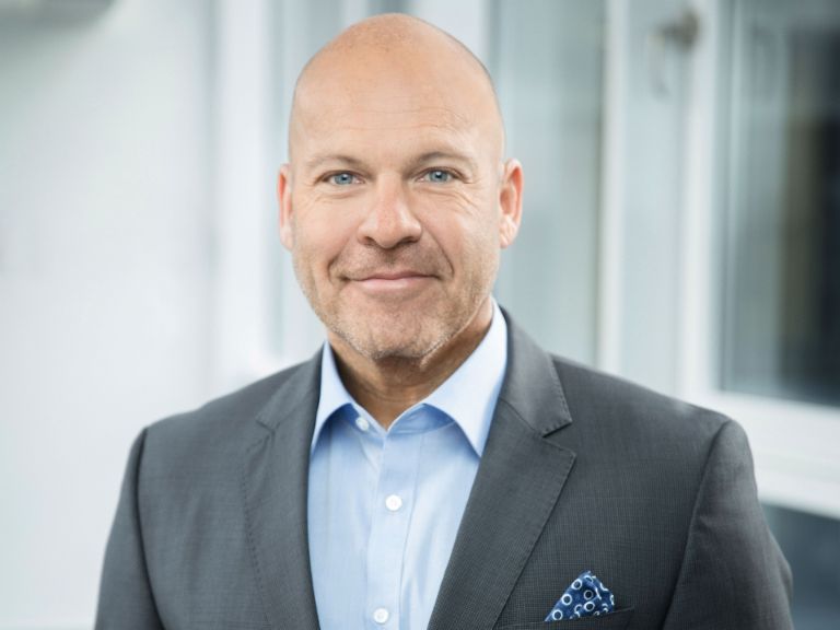 Portrait photograph of Jörg Schweda, Managing Director of EOS Deutscher Inkasso-Dienst (DID) 